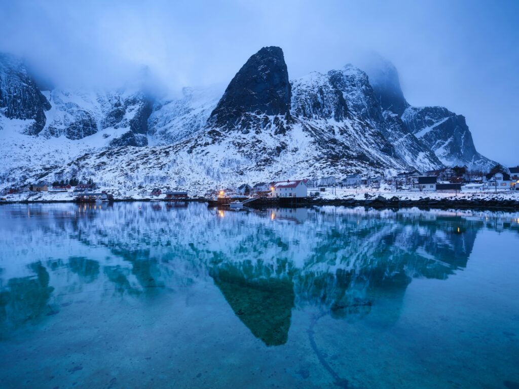 Frozen river and mountain. A classic view in Norway during winter. Otertind mountain, Norway.