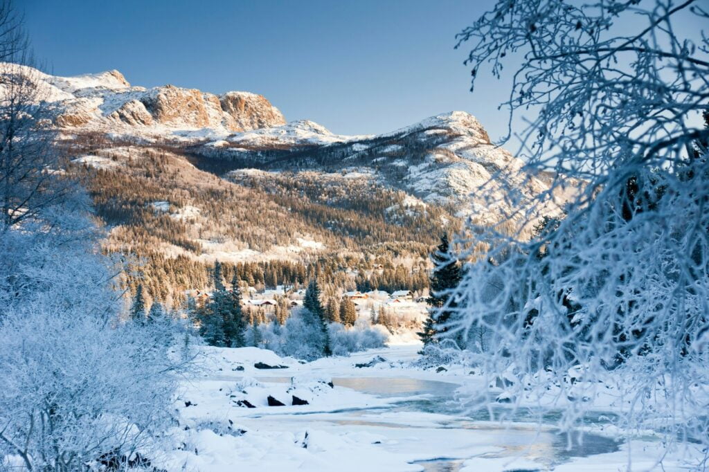 Snowbound landscape mountain river. Hemsedal, Norway. November